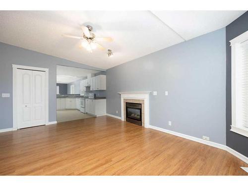 155 Peterson Lane, Fort Mcmurray, AB - Indoor Photo Showing Other Room With Fireplace