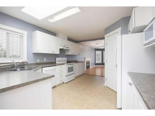 155 Peterson Lane, Fort Mcmurray, AB - Indoor Photo Showing Kitchen With Double Sink