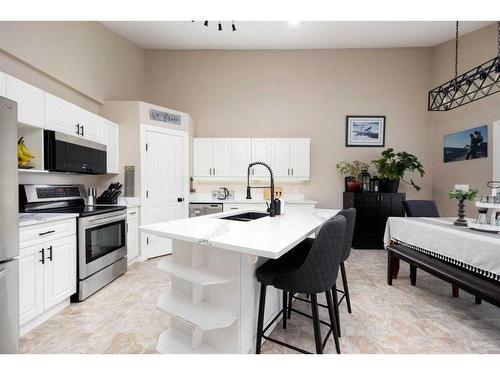 174 Barber Drive, Fort Mcmurray, AB - Indoor Photo Showing Kitchen With Stainless Steel Kitchen With Double Sink