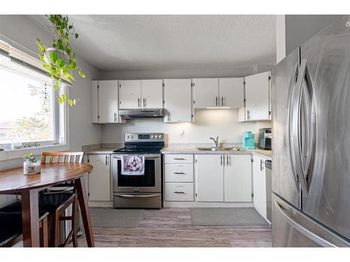 68-400 Silin Forest Road, Fort Mcmurray, AB - Indoor Photo Showing Kitchen With Double Sink