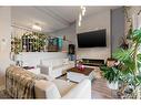 68-400 Silin Forest Road, Fort Mcmurray, AB  - Indoor Photo Showing Living Room With Fireplace 