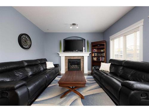 164 Heron Place, Fort Mcmurray, AB - Indoor Photo Showing Living Room With Fireplace