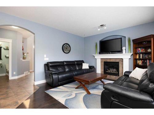 164 Heron Place, Fort Mcmurray, AB - Indoor Photo Showing Living Room With Fireplace