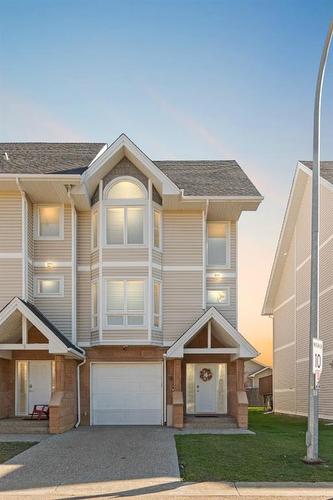 26-98 Wilson Drive, Fort Mcmurray, AB - Outdoor With Facade