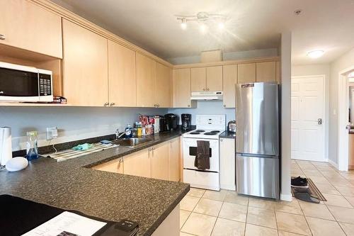 318-8528 Manning Avenue, Fort Mcmurray, AB - Indoor Photo Showing Kitchen