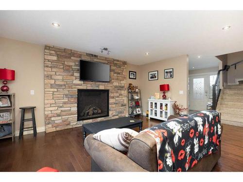 276 Gravelstone Road, Fort Mcmurray, AB - Indoor Photo Showing Living Room With Fireplace