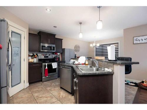 276 Gravelstone Road, Fort Mcmurray, AB - Indoor Photo Showing Kitchen With Double Sink