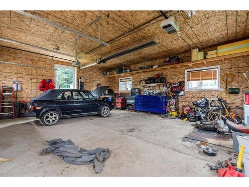 52 Poplar Crescent, Gregoire Lake Estates, AB - Indoor Photo Showing Garage