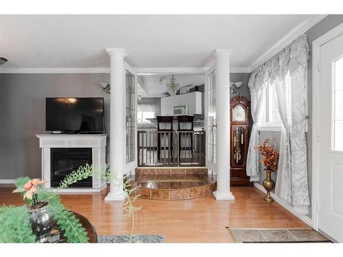 121 Grant Bay, Fort Mcmurray, AB - Indoor Photo Showing Other Room With Fireplace