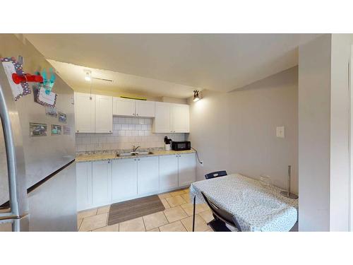 143 Hill Drive, Fort Mcmurray, AB - Indoor Photo Showing Kitchen With Double Sink