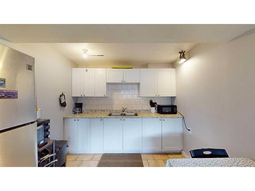 143 Hill Drive, Fort Mcmurray, AB - Indoor Photo Showing Kitchen With Double Sink