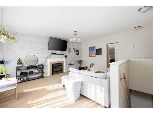 197 Crown Creek Lane, Fort Mcmurray, AB - Indoor Photo Showing Other Room With Fireplace