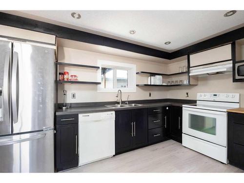 392 Grenfell Crescent, Fort Mcmurray, AB - Indoor Photo Showing Kitchen With Double Sink