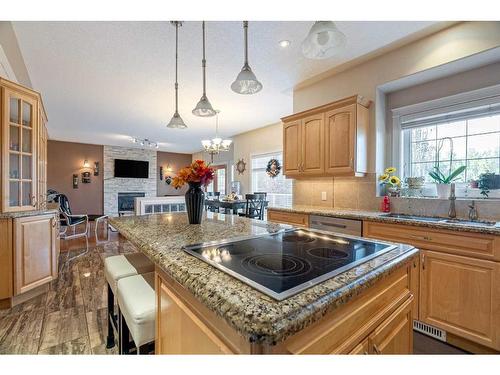 120 Philpott Bay, Fort Mcmurray, AB - Indoor Photo Showing Kitchen With Fireplace With Double Sink