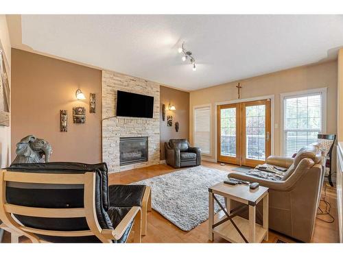 120 Philpott Bay, Fort Mcmurray, AB - Indoor Photo Showing Living Room With Fireplace