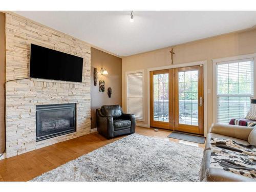 120 Philpott Bay, Fort Mcmurray, AB - Indoor Photo Showing Living Room With Fireplace