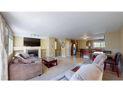 49-220 Swanson Crescent, Fort Mcmurray, AB - Indoor Photo Showing Living Room With Fireplace