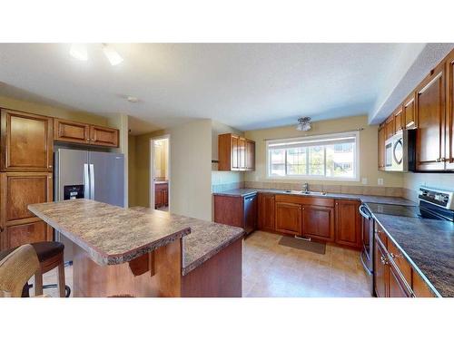 49-220 Swanson Crescent, Fort Mcmurray, AB - Indoor Photo Showing Kitchen With Double Sink