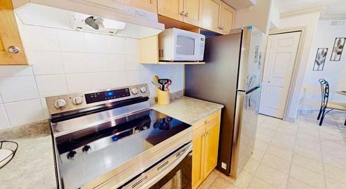 2108-38 Riedel Street, Fort Mcmurray, AB - Indoor Photo Showing Kitchen