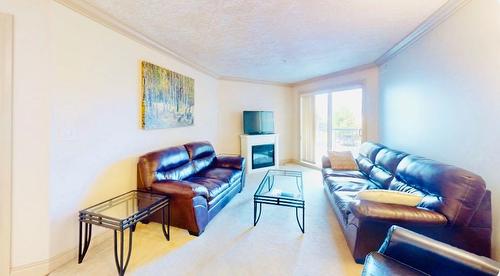 2108-38 Riedel Street, Fort Mcmurray, AB - Indoor Photo Showing Living Room With Fireplace