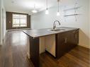 1210-135A Sandpiper Road, Fort Mcmurray, AB  - Indoor Photo Showing Kitchen With Double Sink 