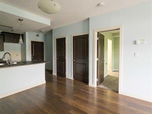 1210-135A Sandpiper Road, Fort Mcmurray, AB - Indoor Photo Showing Kitchen With Double Sink