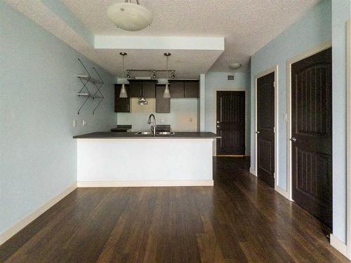 1210-135A Sandpiper Road, Fort Mcmurray, AB - Indoor Photo Showing Kitchen With Double Sink