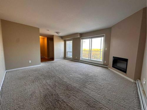 338-201 Abasand Drive, Fort Mcmurray, AB - Indoor With Fireplace