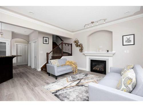 231 Merganser Crescent, Fort Mcmurray, AB - Indoor Photo Showing Living Room With Fireplace