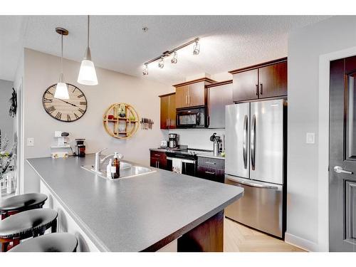 3114-135C Sandpiper Road, Fort Mcmurray, AB - Indoor Photo Showing Kitchen With Stainless Steel Kitchen