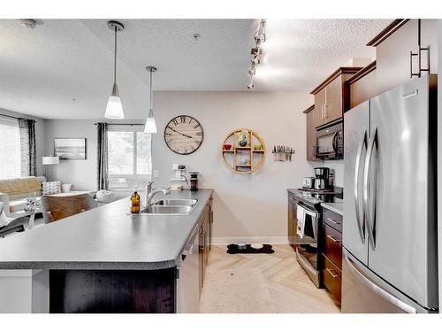 3114-135C Sandpiper Road, Fort Mcmurray, AB - Indoor Photo Showing Kitchen With Stainless Steel Kitchen With Double Sink