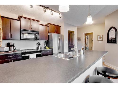 3114-135C Sandpiper Road, Fort Mcmurray, AB - Indoor Photo Showing Kitchen With Double Sink