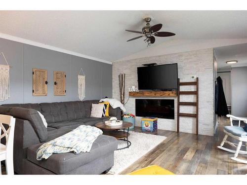 168 Belgian Green, Fort Mcmurray, AB - Indoor Photo Showing Living Room With Fireplace