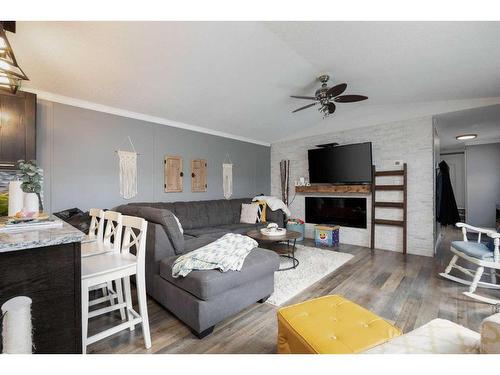 168 Belgian Green, Fort Mcmurray, AB - Indoor Photo Showing Living Room With Fireplace