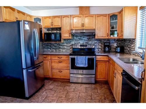 233 Barber Drive, Fort Mcmurray, AB - Indoor Photo Showing Kitchen With Double Sink