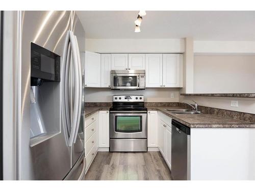 415-248A Grosbeak Way, Fort Mcmurray, AB - Indoor Photo Showing Kitchen With Stainless Steel Kitchen With Double Sink