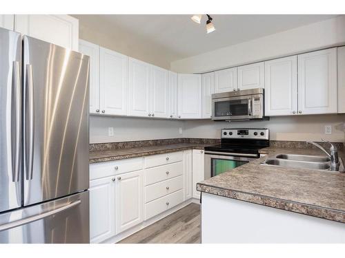 415-248A Grosbeak Way, Fort Mcmurray, AB - Indoor Photo Showing Kitchen With Stainless Steel Kitchen With Double Sink