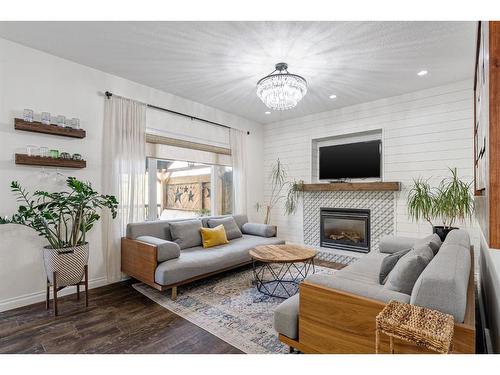 167 Peterson Lane, Fort Mcmurray, AB - Indoor Photo Showing Living Room With Fireplace