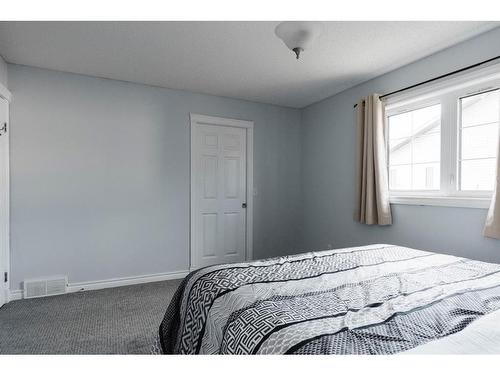 206 Carteret Drive, Fort Mcmurray, AB - Indoor Photo Showing Bedroom