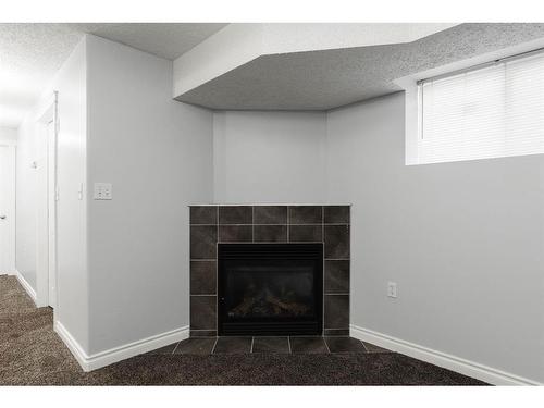 206 Carteret Drive, Fort Mcmurray, AB - Indoor With Fireplace