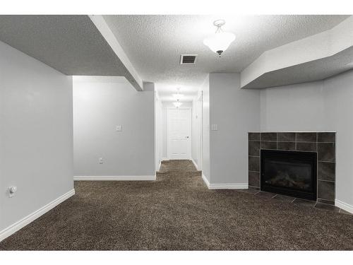 206 Carteret Drive, Fort Mcmurray, AB - Indoor With Fireplace