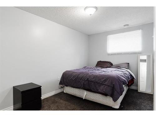 206 Carteret Drive, Fort Mcmurray, AB - Indoor Photo Showing Bedroom