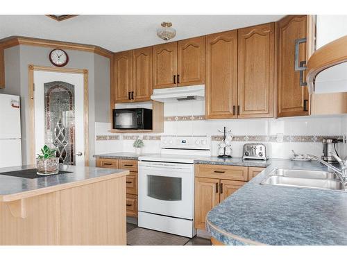 132 Westwood Drive, Fort Mcmurray, AB - Indoor Photo Showing Kitchen With Double Sink