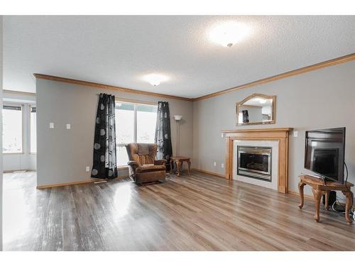 132 Westwood Drive, Fort Mcmurray, AB - Indoor Photo Showing Living Room With Fireplace