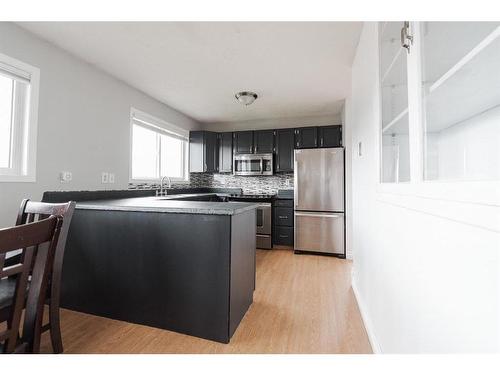 110 Leigh Crescent, Fort Mcmurray, AB - Indoor Photo Showing Kitchen With Stainless Steel Kitchen With Upgraded Kitchen