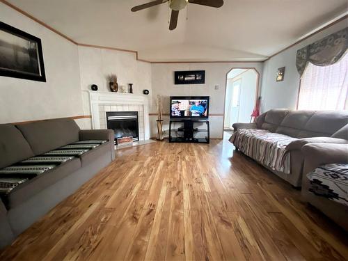 183 Grenoble Crescent, Fort Mcmurray, AB - Indoor Photo Showing Living Room With Fireplace