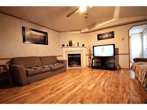 183 Grenoble Crescent, Fort Mcmurray, AB - Indoor Photo Showing Living Room With Fireplace