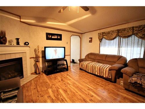 183 Grenoble Crescent, Fort Mcmurray, AB - Indoor Photo Showing Living Room With Fireplace