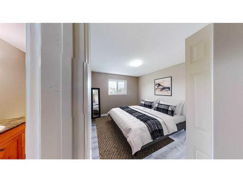 102-13441 Twp Rd 665A, Lac La Biche, AB - Indoor Photo Showing Bedroom