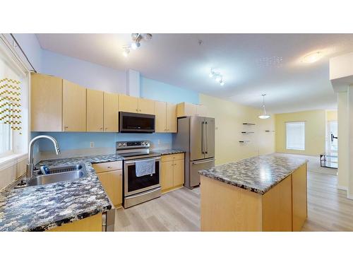 7103-200 Lougheed Drive, Fort Mcmurray, AB - Indoor Photo Showing Kitchen With Double Sink